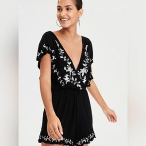 American Eagle Black and White embroidered flutter sleeve slinky romper v neck